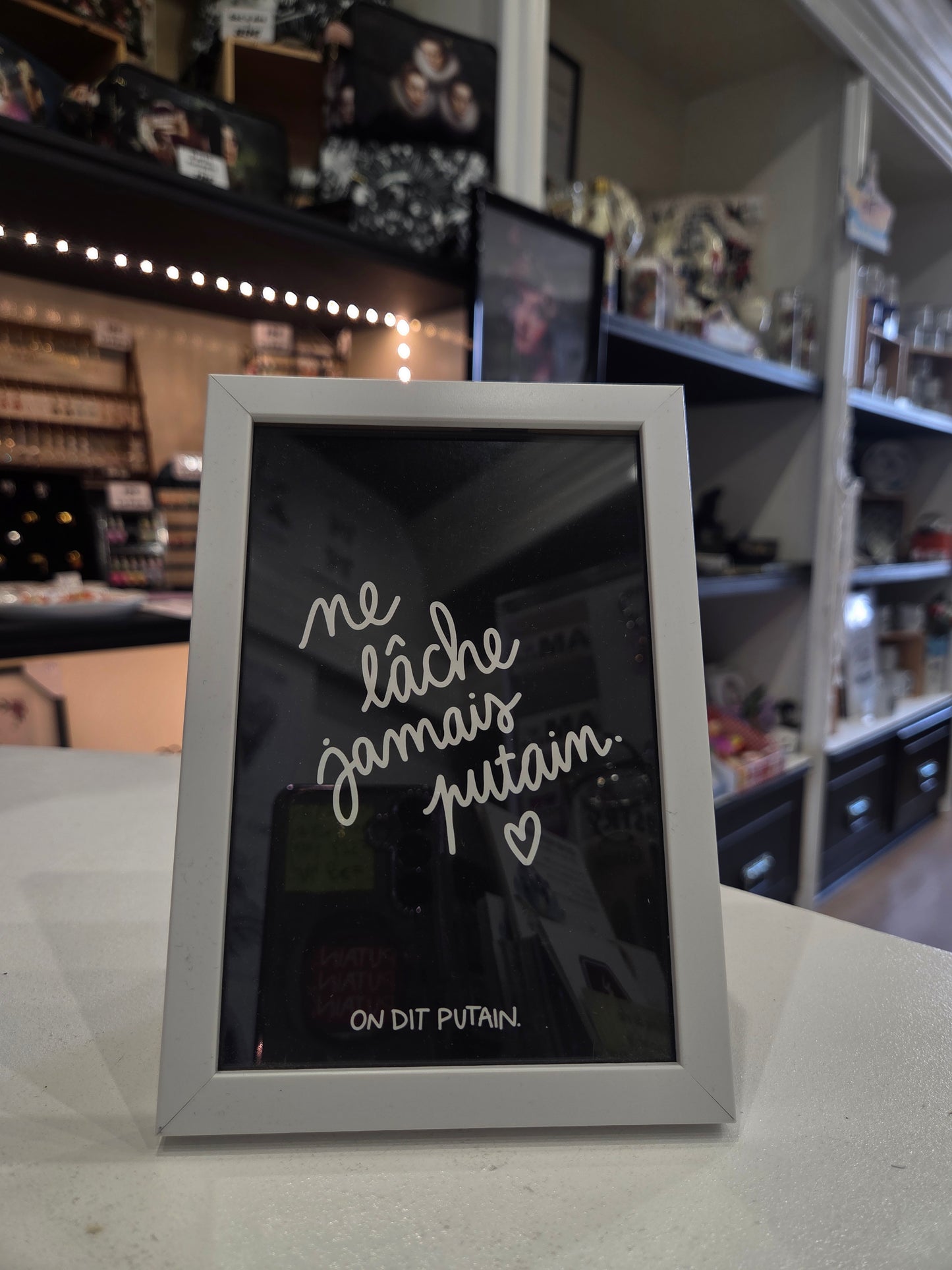 Cadre argenté " ne lâche rien putain "