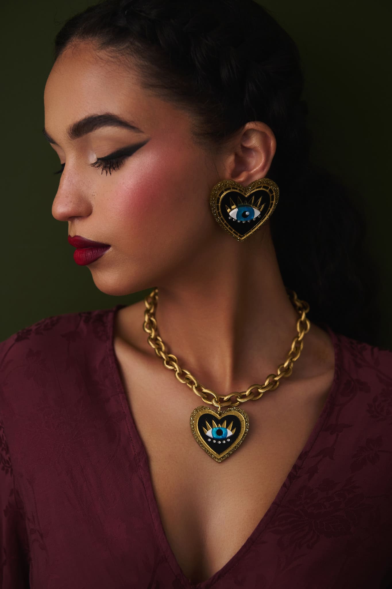 Boucle d'oreille enigma cœur oeil doré